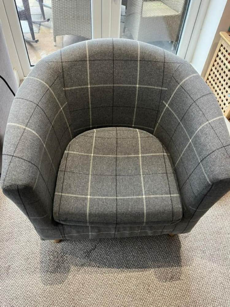 Grey check tub chair after Ovenqueen upholstery cleaning — Teesside